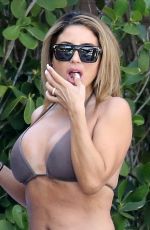 LARSA PIPPEN in Bikini at a Pool in Miami 03/13/2021