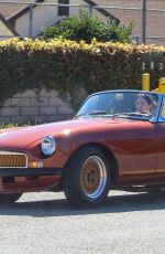 LAUREN SILVERMAN and Simon Cowell Out Driving in Vintage MG Turbo in Malibu 03/17/2021