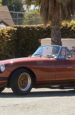 LAUREN SILVERMAN and Simon Cowell Out Driving in Vintage MG Turbo in Malibu 03/17/2021