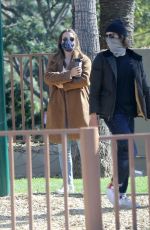 LEIGHTON MEESTER and Adam Brody at a Park in Los Angeles 03/15/2021