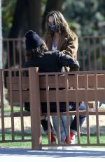 LEIGHTON MEESTER and Adam Brody at a Park in Los Angeles 03/15/2021