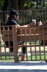 LEIGHTON MEESTER and Adam Brody at a Park in Los Angeles 03/15/2021