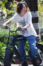 LENA HEADEY Rides Electric Motorbike Out in Los Angeles 03/16/2021
