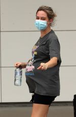 Pregnant TESS STRUBER at Cairns Airport 03/02/2021