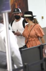 VANESSA MINNILLO Arrives at LAX Airport in Los Angeles 03/23/2021