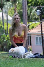 ALEXIS REN Playing with Her Dog at a Park in Los Angeles 04/27/2021