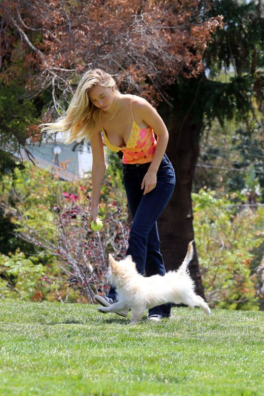 ALEXIS REN Playing with Her Dog at a Park in Los Angeles 04/27/2021