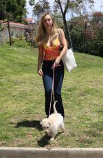 ALEXIS REN Playing with Her Dog at a Park in Los Angeles 04/27/2021