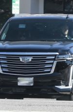 ANNE HATHAWAY and Adam Shulman Out Driving in Los Angeles 04/26/2021