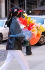 BELLA HADID with a Huge Bouquet of Flowers Out in New York 04/23/2021
