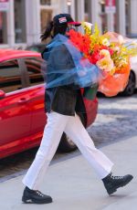 BELLA HADID with a Huge Bouquet of Flowers Out in New York 04/23/2021