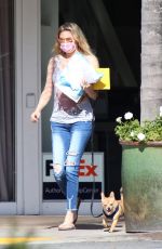 BRANDI GLANVILLE Leaves a Post Office in Bel-Air 04/14/2021