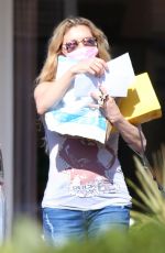 BRANDI GLANVILLE Leaves a Post Office in Bel-Air 04/14/2021