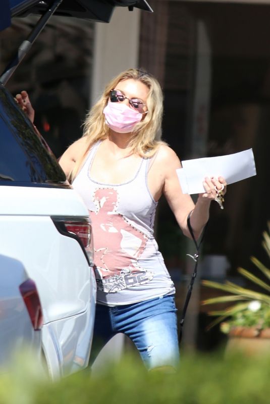 BRANDI GLANVILLE Leaves a Post Office in Bel-Air 04/14/2021