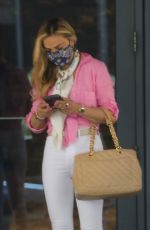 CARRIE UNDERWOOD Leaves Her Hotel in Miami 04/16/2021