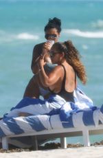 EVELYN LOZADA and SHANIECE HAIRSTON in Swimsuits at a Beach in Miami 04/28/2021