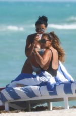 EVELYN LOZADA and SHANIECE HAIRSTON in Swimsuits at a Beach in Miami 04/28/2021
