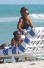 EVELYN LOZADA and SHANIECE HAIRSTON in Swimsuits at a Beach in Miami 04/28/2021