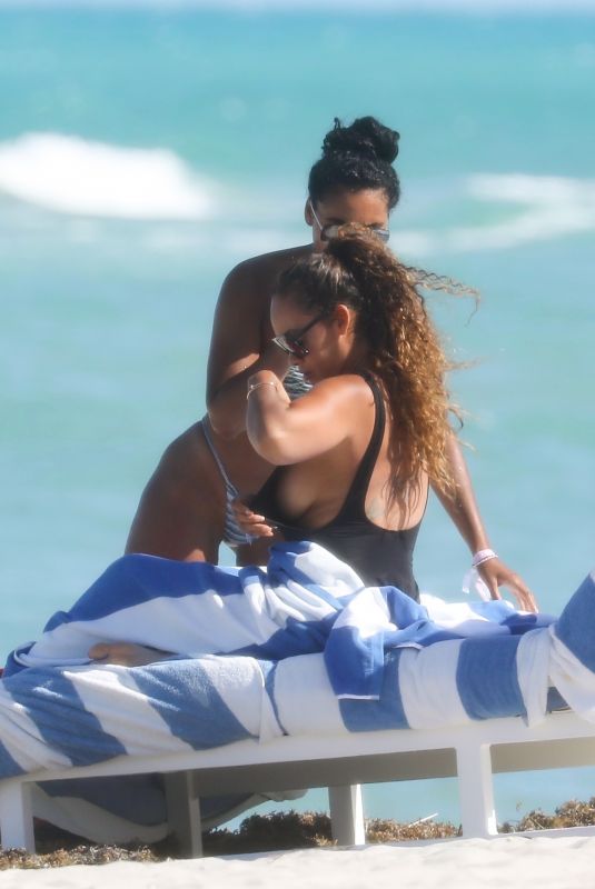 EVELYN LOZADA and SHANIECE HAIRSTON in Swimsuits at a Beach in Miami 04/28/2021