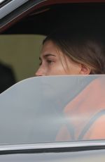 HAILEY BIEBER Out Driving in Los Angeles 04/12/2021
