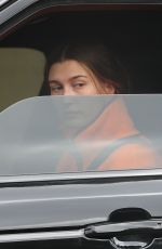 HAILEY BIEBER Out Driving in Los Angeles 04/12/2021