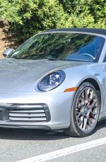 JENNIFER ANISTON Out Driving in Her Porsche 911 Targa in West Hollywood 04/06/2021