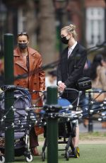 KARLIE KLOSS and IRINA SHAYK at Washington Square Park in New York 04/10/2021