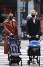 KARLIE KLOSS and IRINA SHAYK at Washington Square Park in New York 04/10/2021