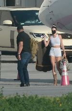 KENDALL and KYLIE JENNER Arrives by Private Jet in Los Angeles 04/05/2021