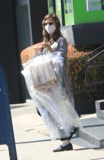 LILY COLLINS Leaves a Drycleaner in West Hollywood 03/31/2021
