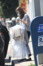 LILY COLLINS Leaves a Drycleaner in West Hollywood 03/31/2021