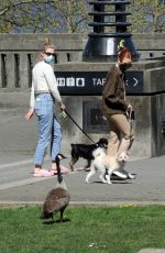 MADELAINE PETSCH and LILI REINHART Out with Their Dogs in Vancouver 04/21/2021