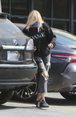 MALIN AKERMAN in Ripped Denim Out in Los Angeles 04/10/2021