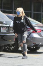 MALIN AKERMAN in Ripped Denim Out in Los Angeles 04/10/2021