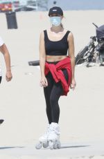 MARGOT ROBBIE Out Rollerblading at a Beach in Malibu 04/18/2021