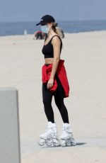 MARGOT ROBBIE Out Rollerblading at a Beach in Malibu 04/18/2021