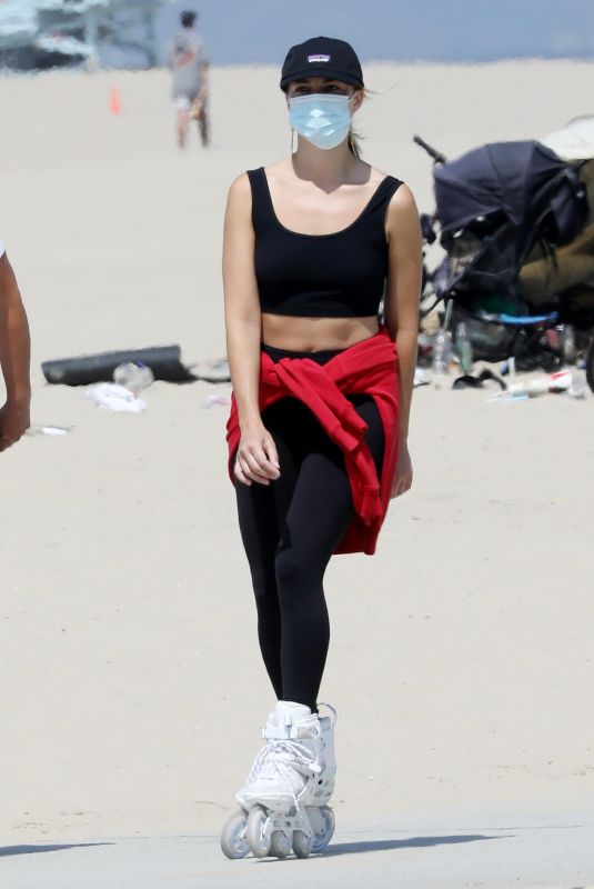 MARGOT ROBBIE Out Rollerblading at a Beach in Malibu 04/18/2021