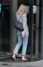 MOLLIE KING in DEnim Arrives at BBC Radio One Studios in London 04/11/2021