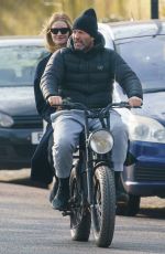 ROSIE HUNTINGTON-WHITELEY and Jason Statham Rides Electric Bike Out in London 03/24/2021