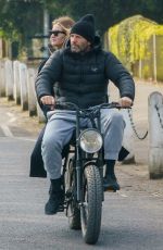 ROSIE HUNTINGTON-WHITELEY and Jason Statham Rides Electric Bike Out in London 03/24/2021