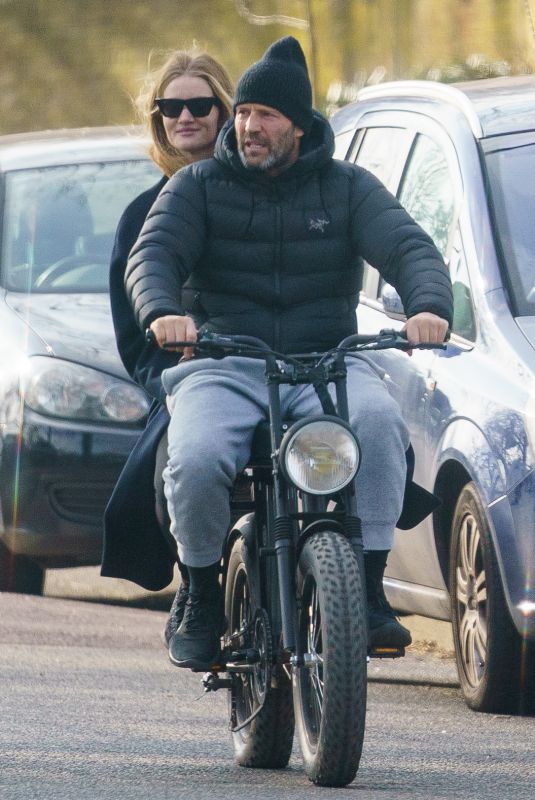 ROSIE HUNTINGTON-WHITELEY and Jason Statham Rides Electric Bike Out in London 03/24/2021