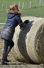 SUMMER MONTEYS-FULLAM Pushing a Bale of Hay at a Field in London 04/05/2021