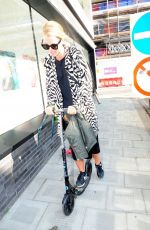VOGUE WILLIAMS Out on Her Scooter in London 04/19/2021