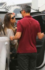 ALESSANDRA AMBROSIO and Richard Lee Out Kissing at LAX in Los Angeles 05/12/2021