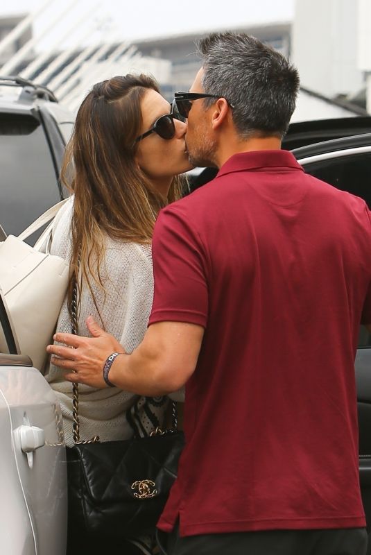 ALESSANDRA AMBROSIO and Richard Lee Out Kissing at LAX in Los Angeles 05/12/2021