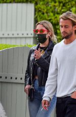 ASHLEY BENSON and Alex Osbourne Out in Los Angeles 05/16/2021