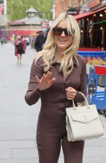 ASHLEY ROBERTS in a Brown Catsuit at Heart Radio in London 05/20/2021