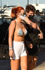 BELLA THORNE in Bikini Top Arrives at a Yacht in Miami 05/05/2021