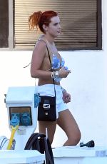 BELLA THORNE in Bikini Top Arrives at a Yacht in Miami 05/05/2021