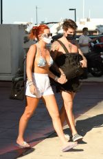 BELLA THORNE in Bikini Top Arrives at a Yacht in Miami 05/05/2021